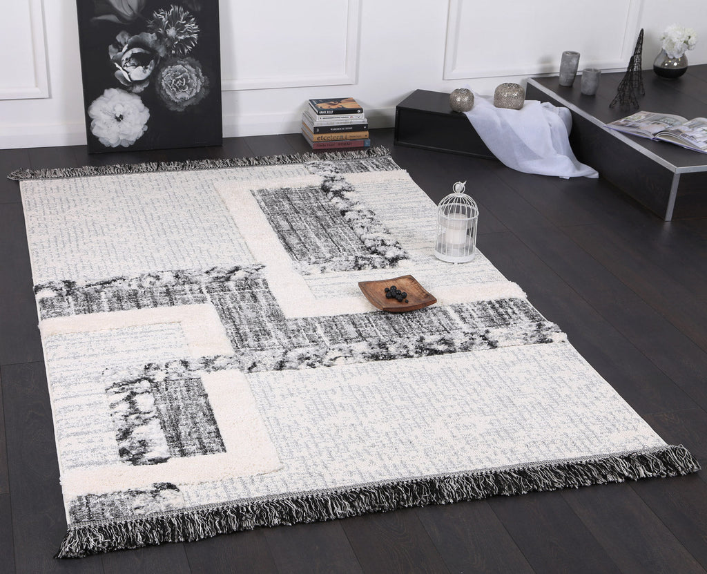 Kaza Tribal Modern Cream Anthracite Rug - 9011B CREA styled with furniture