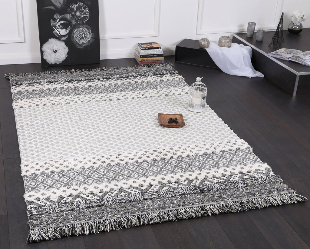 Kaza Tribal Edge Cream Anthracite Rug - 9030A GREY styled with furniture