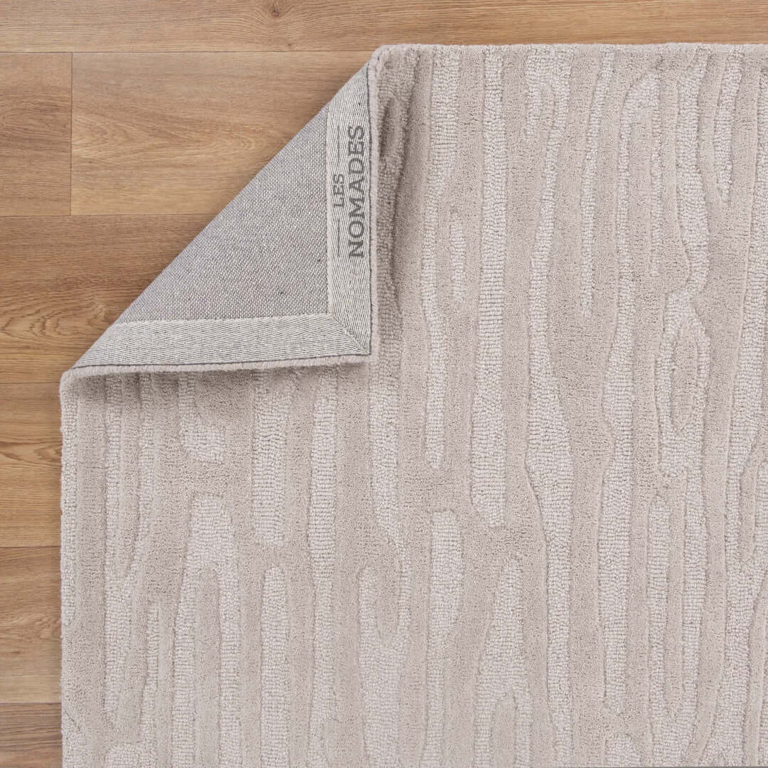 Les Nomades Sandstorm Beige wool rug - detail