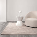 Les Nomades Sandstorm Beige wool rug - room setting