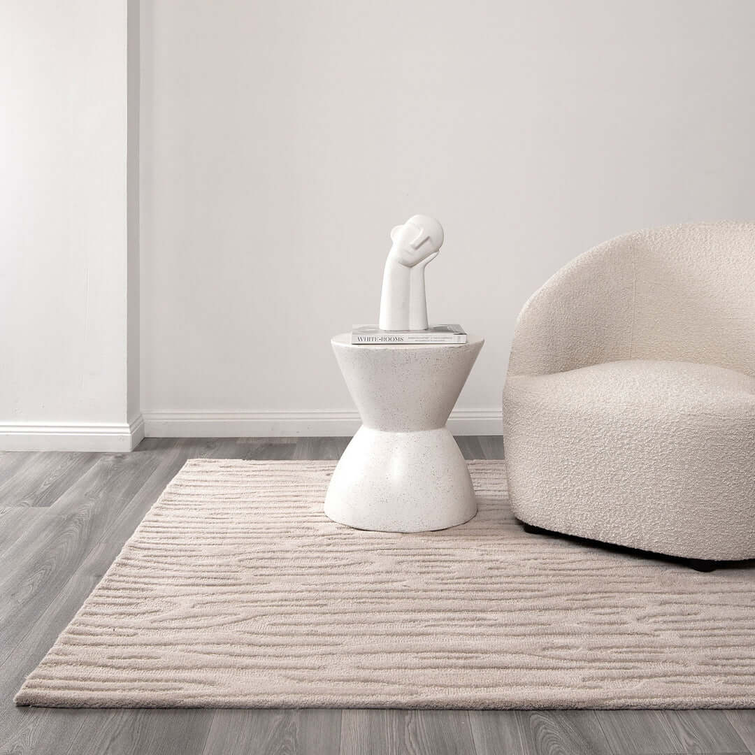Les Nomades Sandstorm Beige wool rug - room setting