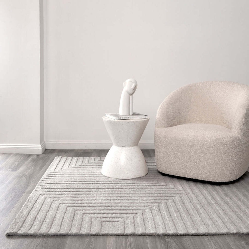 Les Nomades Felix Light Grey wool rug - room setting