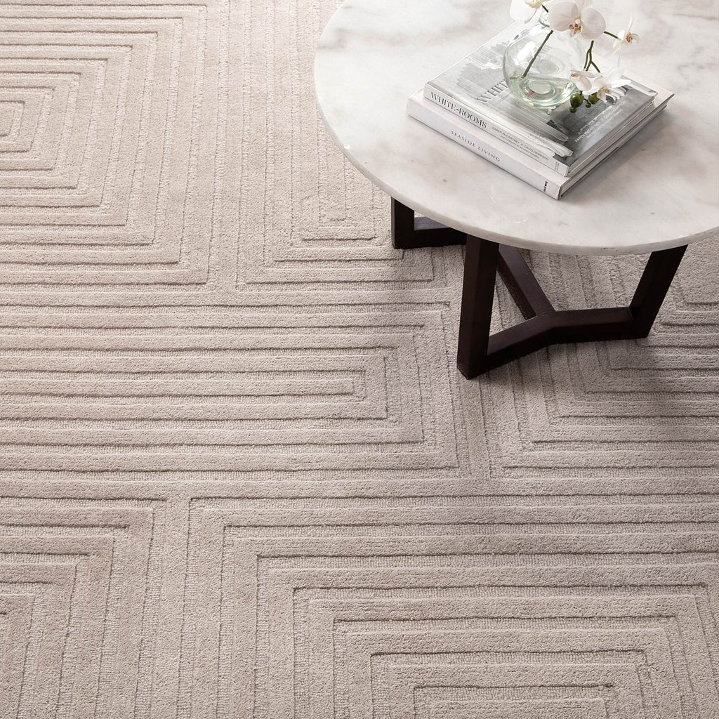 Les Nomades LES07 Beige Geometric Wool Rug styled with furniture