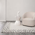 Les Nomades Leopard Cream Grey Wool Rug lifestyle view