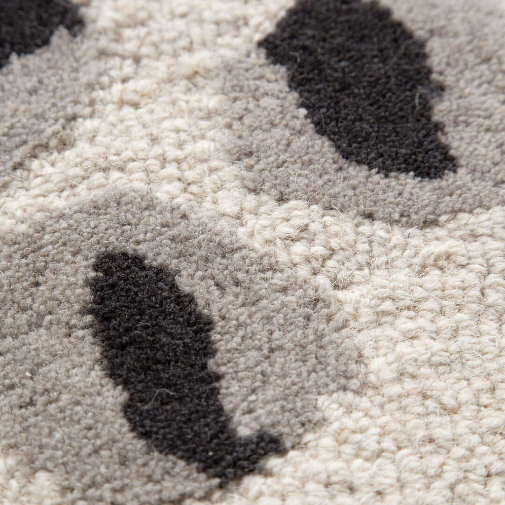 Les Nomades Leopard Cream Grey Wool Rug close-up