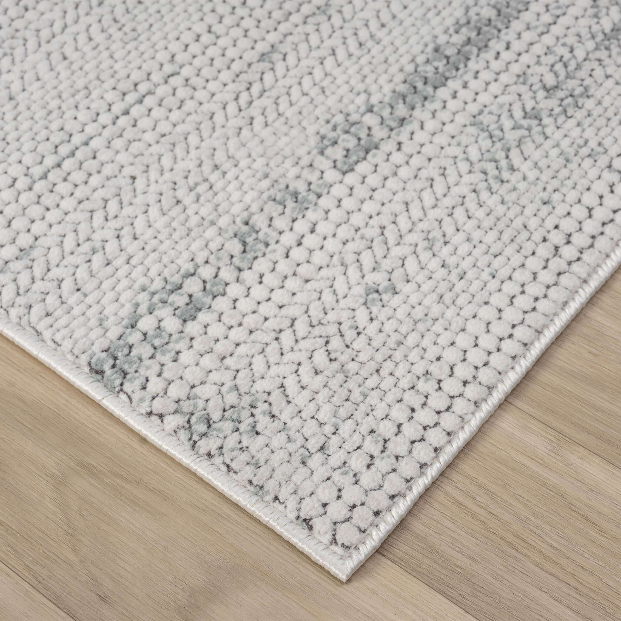 Cream Area Rug with plush, non-shed pile and all-side binding. Power-loomed in Türkiye for durable, easy-care elegance in modern living spaces.
