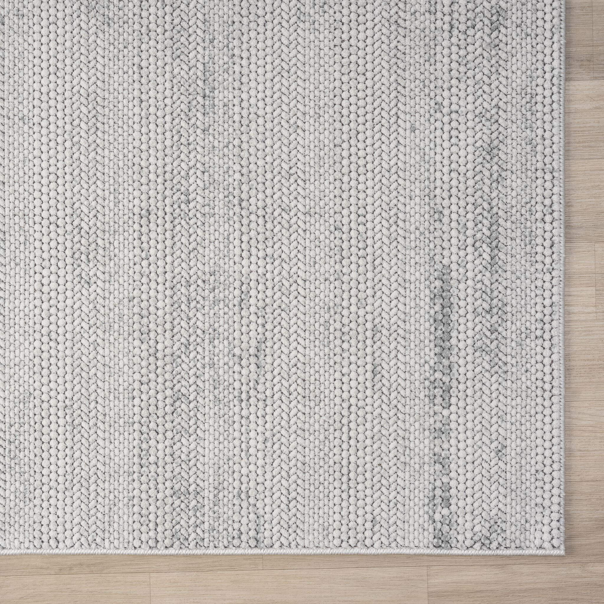 Cream Area Rug with plush, non-shed pile and all-side binding. Power-loomed in Türkiye for durable, easy-care elegance in modern living spaces.