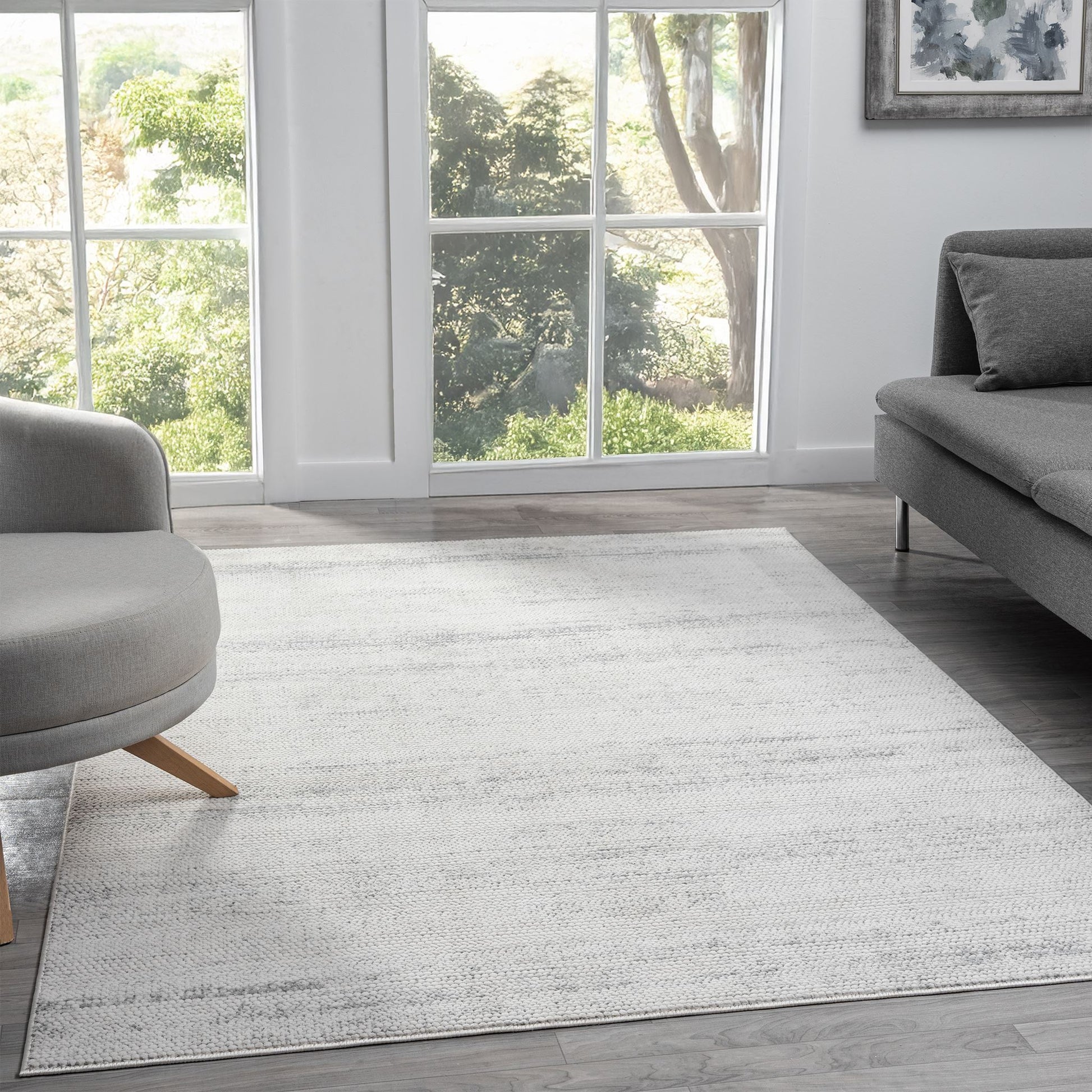Cream Area Rug with plush, non-shed pile and all-side binding. Power-loomed in Türkiye for durable, easy-care elegance in modern living spaces.