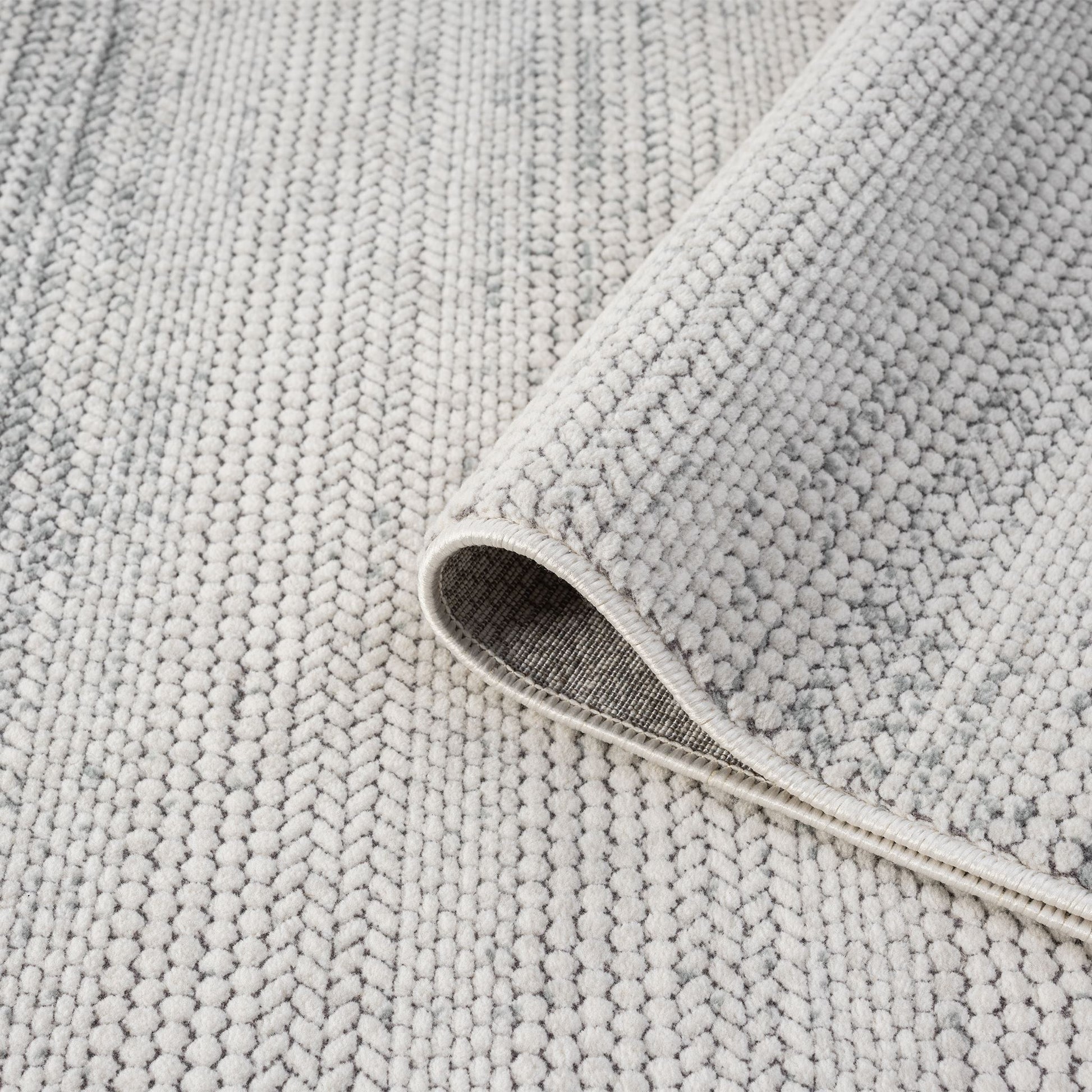 Cream Area Rug with plush, non-shed pile and all-side binding. Power-loomed in Türkiye for durable, easy-care elegance in modern living spaces.