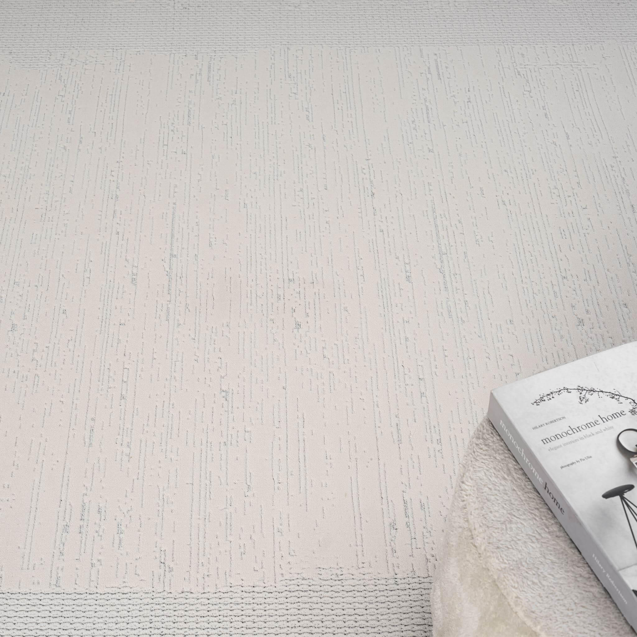 Ivory Area Rug with plush, non-shed pile and all-side binding. Power-loomed in Türkiye for durable, easy-care elegance in modern living spaces.