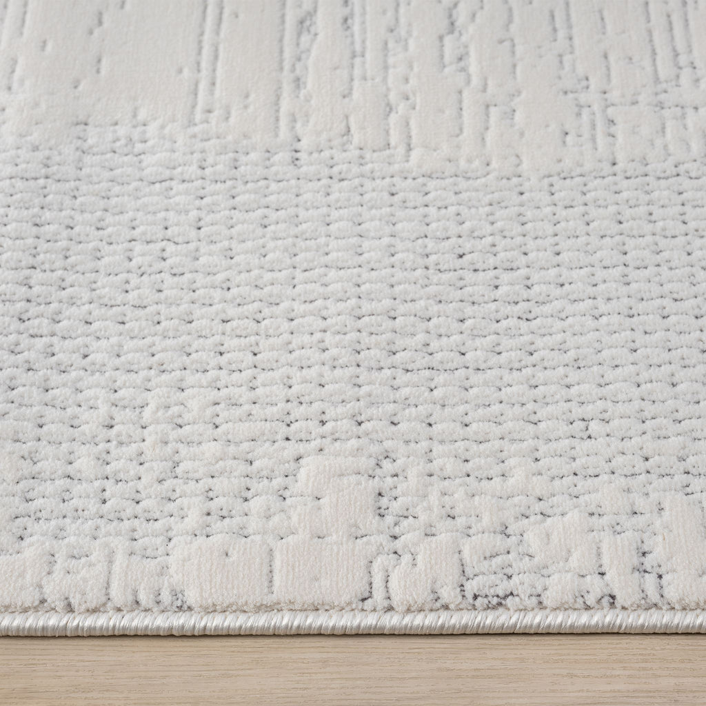 Ivory Area Rug with plush, non-shed pile and all-side binding. Power-loomed in Türkiye for durable, easy-care elegance in modern living spaces.