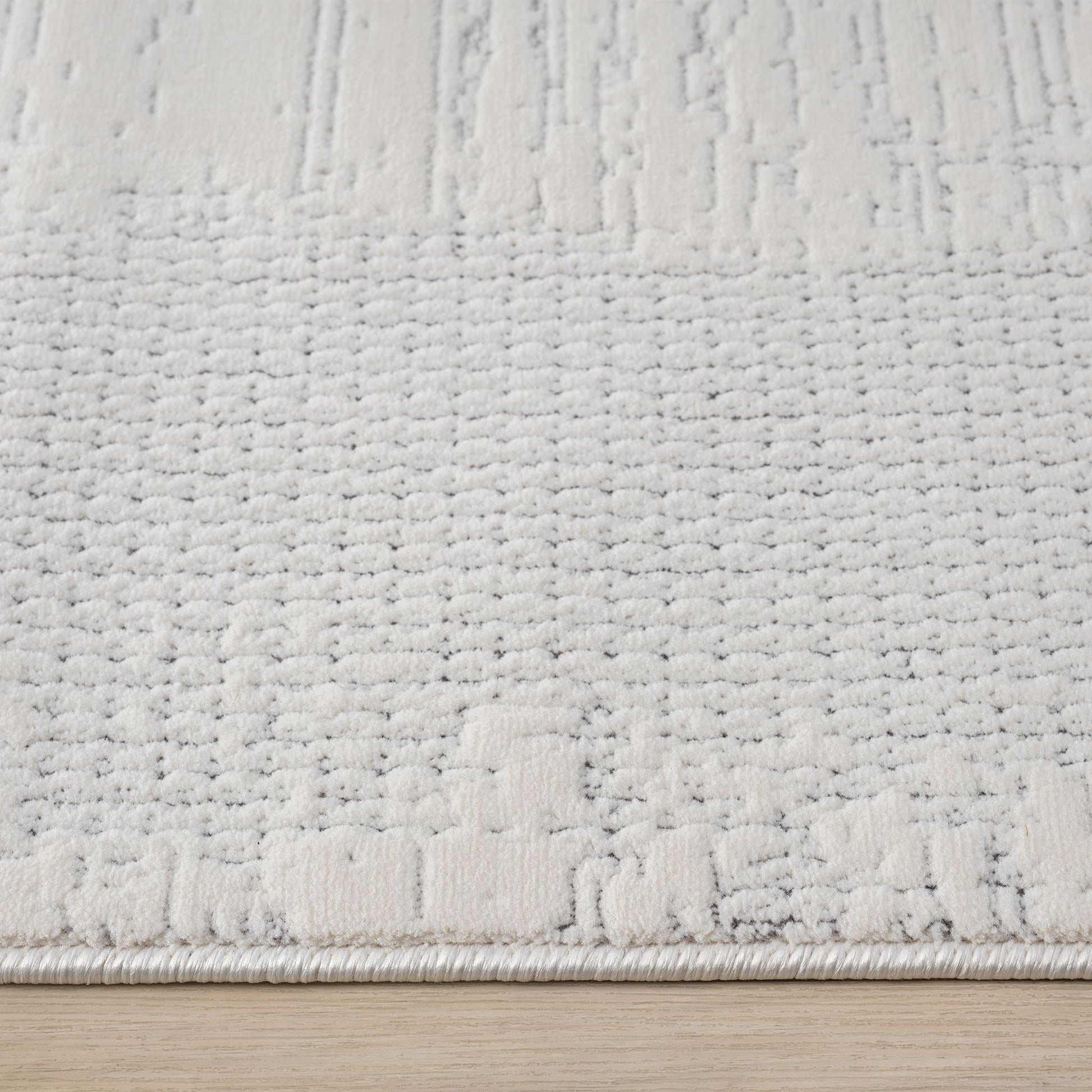 Ivory Area Rug with plush, non-shed pile and all-side binding. Power-loomed in Türkiye for durable, easy-care elegance in modern living spaces.