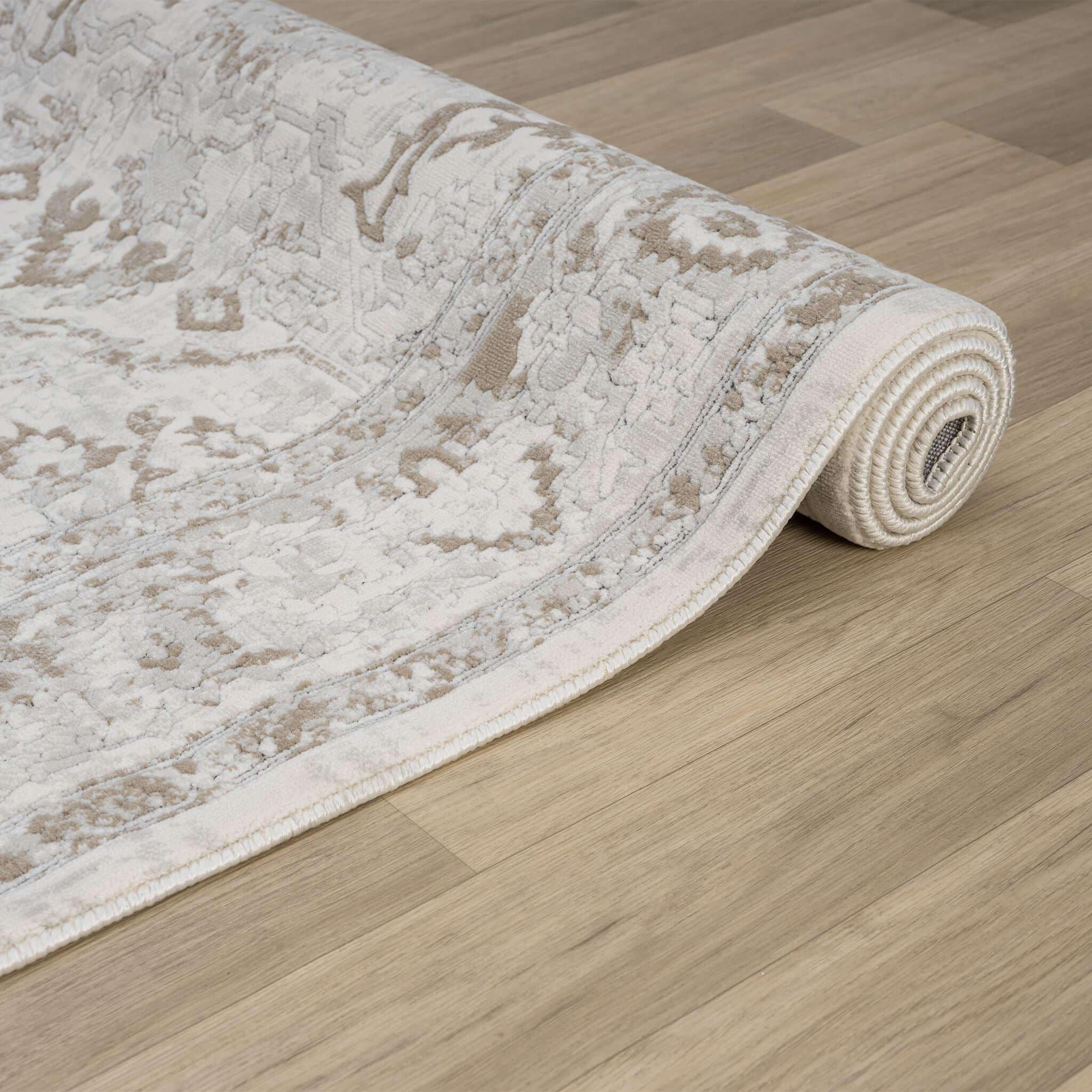 Cream Area Rug with plush, non-shed pile and all-side binding. Power-loomed in Türkiye for durable, easy-care elegance in modern living spaces