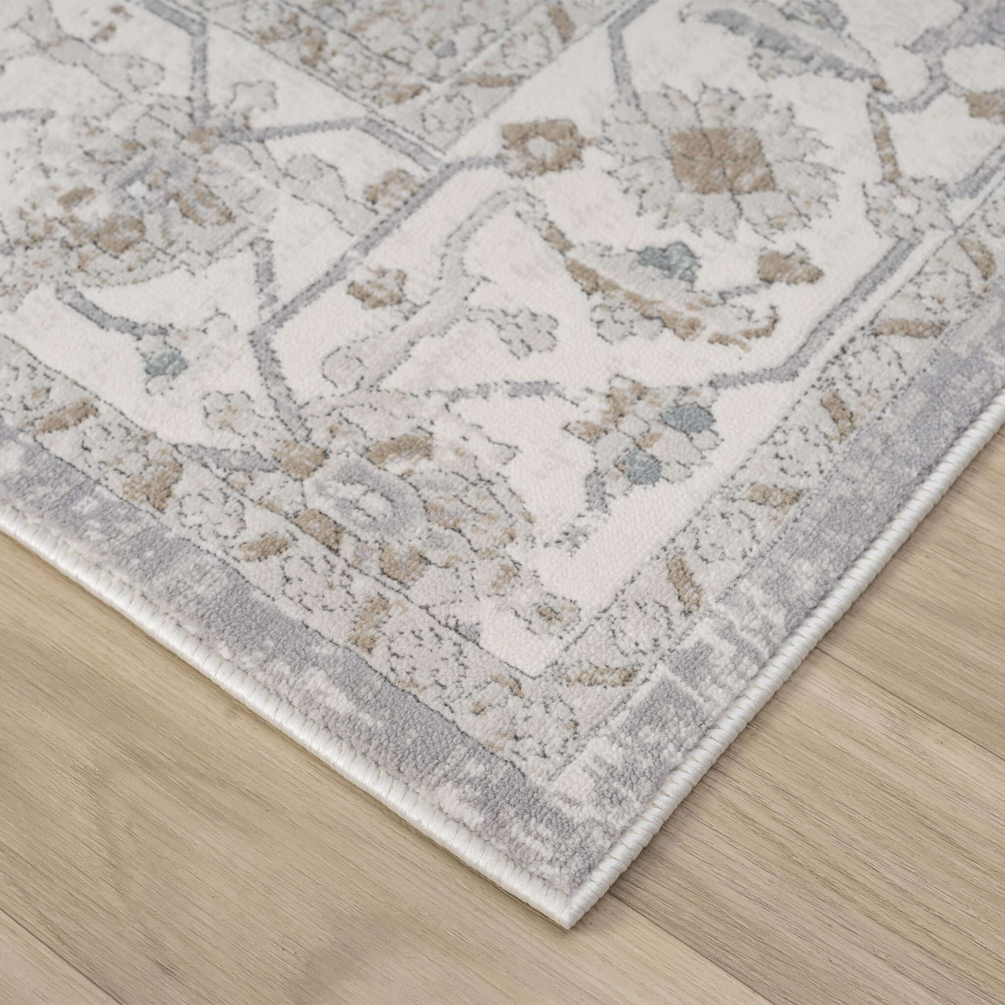 Cream Area Rug with plush, non-shed pile and all-side binding. Power-loomed in Türkiye for durable, easy-care elegance in living rooms and bedrooms.