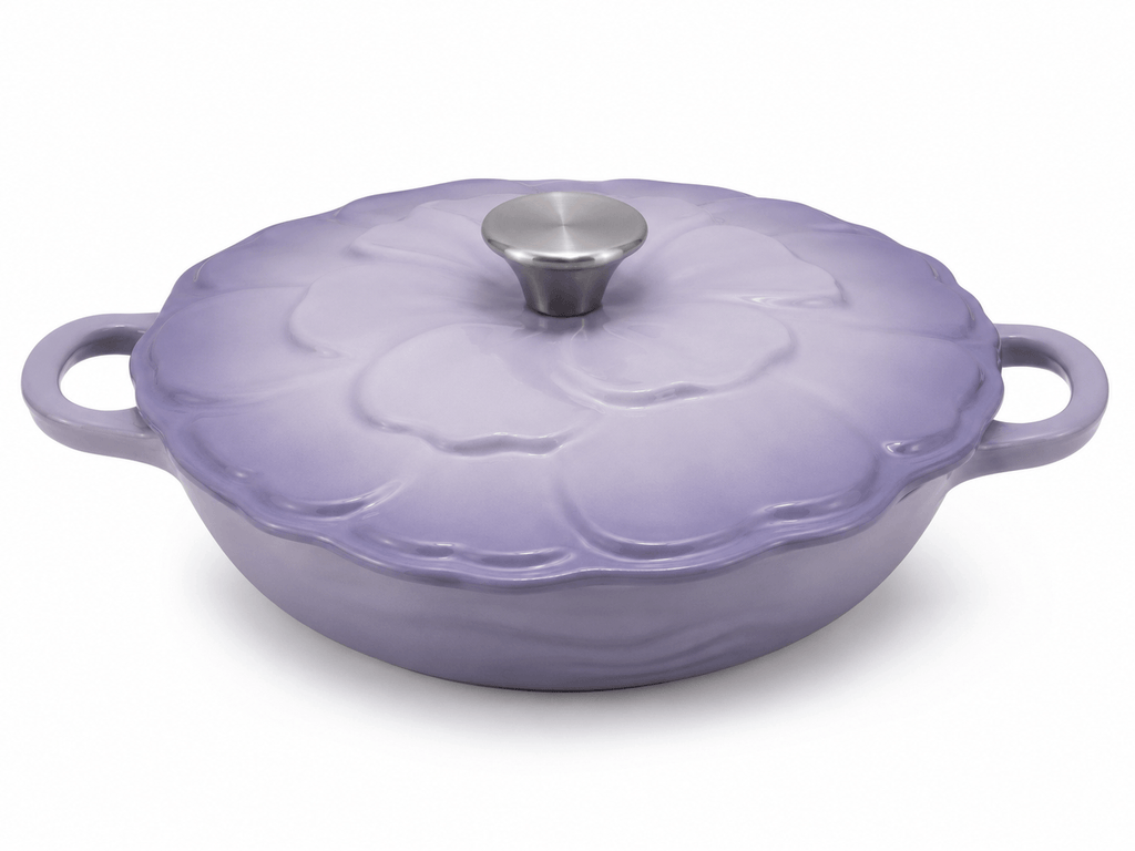 Le Creuset flower cast iron casserole dish 26cm in lavender purple with flower-shaped lid.