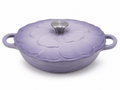 Le Creuset flower cast iron casserole dish 26cm in lavender purple with flower-shaped lid.