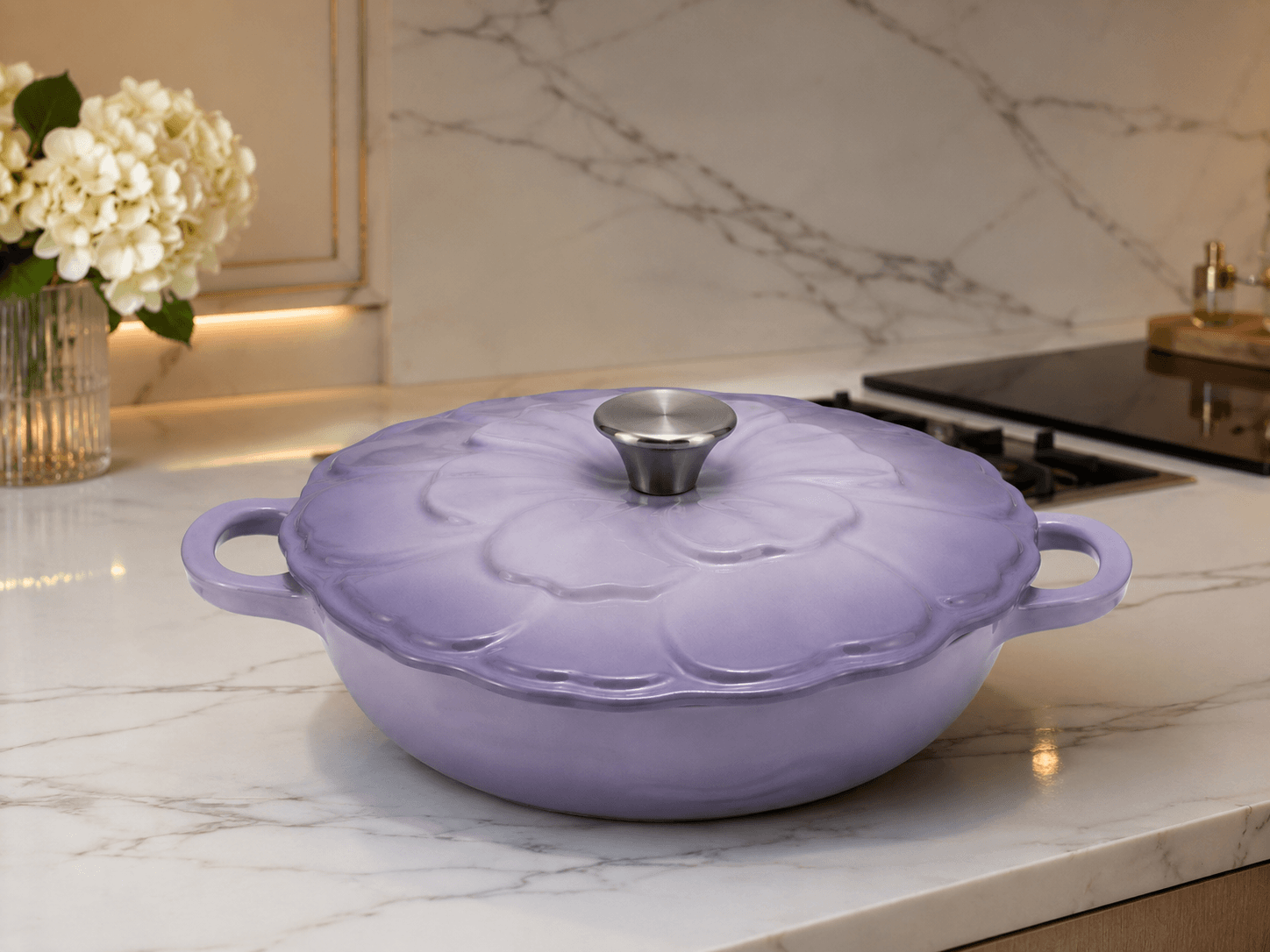 Le Creuset Flower Cast Iron Casserole Dish 26cm in Lavender Purple on a marble countertop.