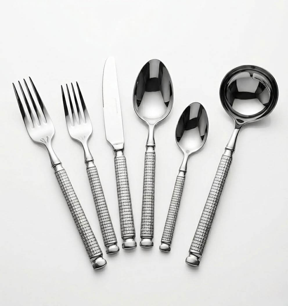 Luxury 85-Piece Stainless Steel Cutlery Set showcasing elegant forks, knives, spoons, and ladles laid out beautifully.
