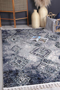 Mansour Incan Blue Geometric Rug - 2BLUE styled with furniture