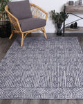 Marbella Blue Contemporary Rug - 60215LGRY styled with furniture