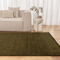 Charleston Green Hand Knotted Wool Blend Rug styled with furniture