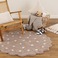 Mellow Mushroom Beige Round Scalloped Kids Rug styled with furniture