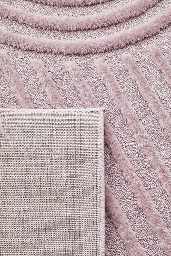 Close-up of the Marigold Dior Pink Modern Textured Rug showcasing its plush surface and geometric design, emphasizing modern pink textured rug.