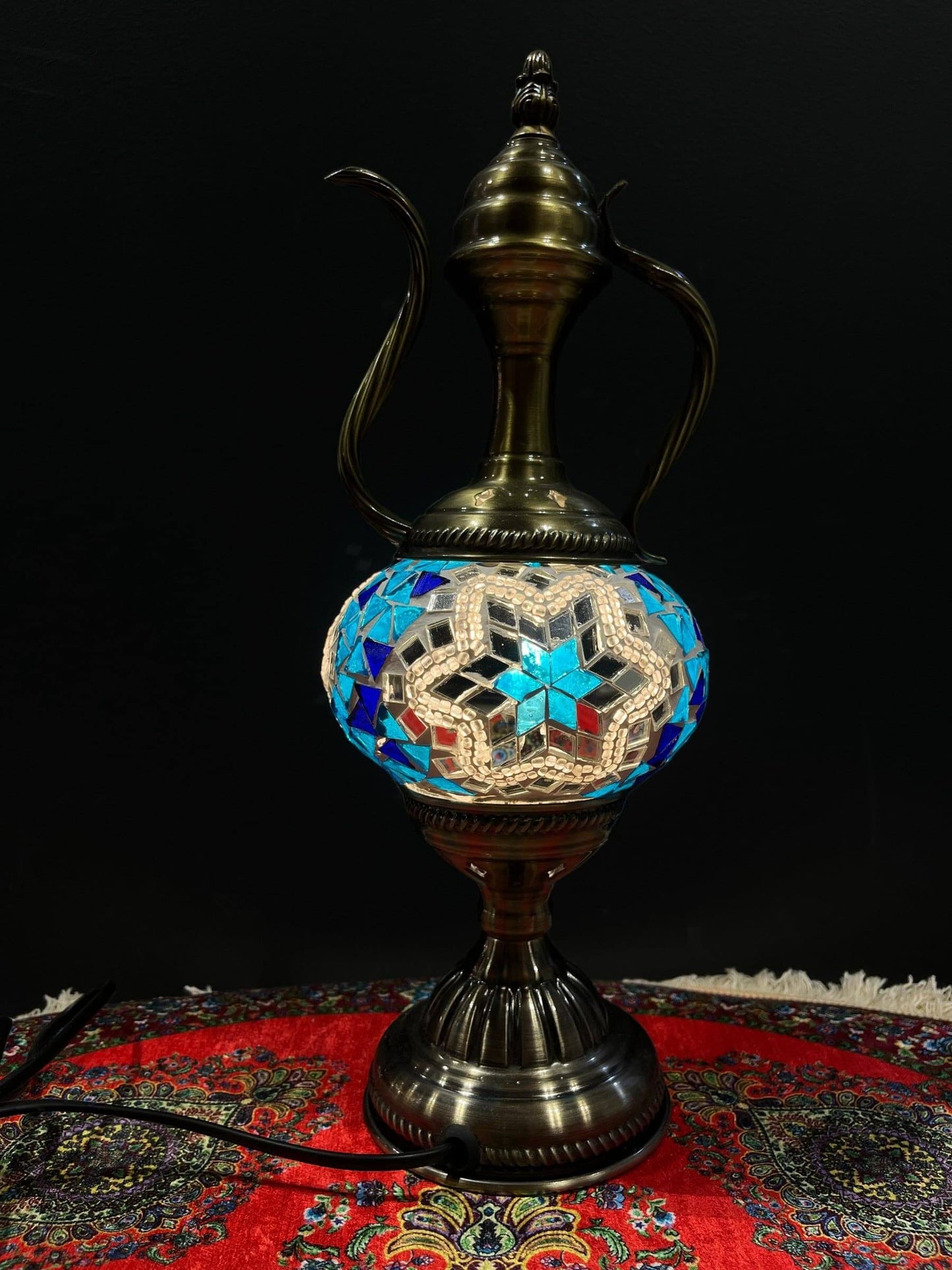 Mosaic Genie Lamp Blue Star Light-Elevate your decor with the enchanting charm of our Turkish Mosaic Genie Lamp. Handcrafted by skilled artisans, this exquisite lamp captures the spirit of the mystical East. Its intricate mosaic glass design creates a mes