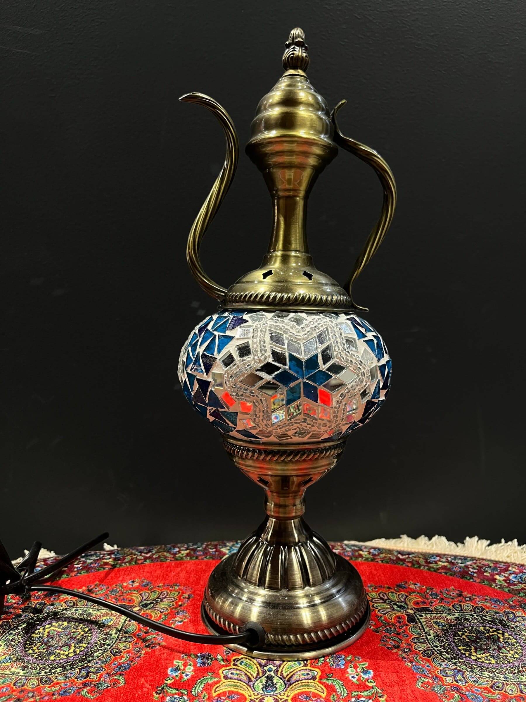 Mosaic Genie Lamp Blue Star Light-Elevate your decor with the enchanting charm of our Turkish Mosaic Genie Lamp. Handcrafted by skilled artisans, this exquisite lamp captures the spirit of the mystical East. Its intricate mosaic glass design creates a mes