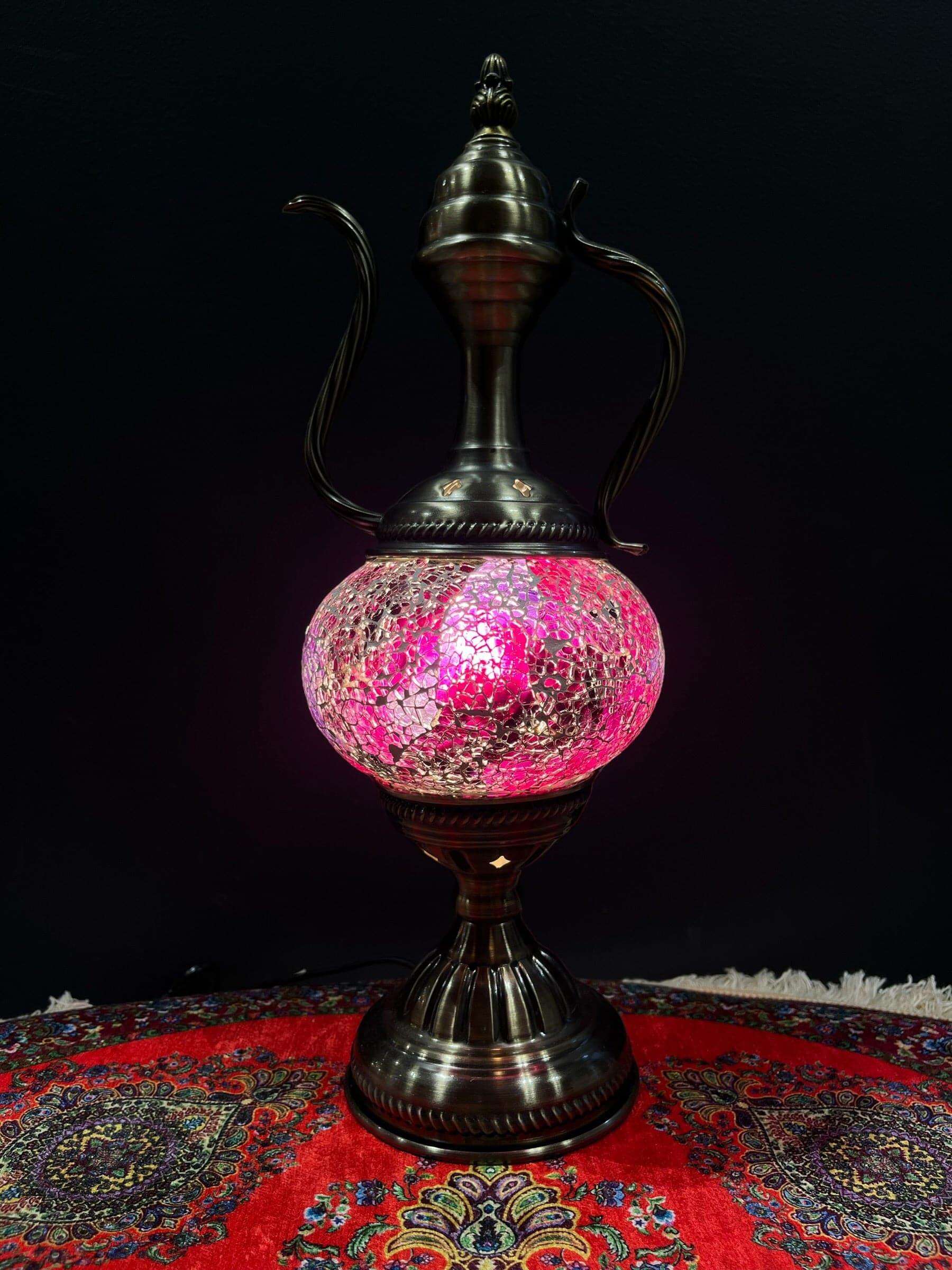 Mosaic Genie Lamp Purple Crackle-Elevate your decor with the enchanting charm of our Turkish Mosaic Genie Lamp. Handcrafted by skilled artisans, this exquisite lamp captures the spirit of the mystical East. Its intricate mosaic glass design creates a mesm