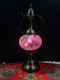 Mosaic Genie Lamp Purple Crackle-Elevate your decor with the enchanting charm of our Turkish Mosaic Genie Lamp. Handcrafted by skilled artisans, this exquisite lamp captures the spirit of the mystical East. Its intricate mosaic glass design creates a mesm