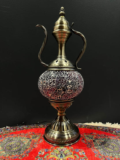 Mosaic Genie Lamp Purple Crackle-Elevate your decor with the enchanting charm of our Turkish Mosaic Genie Lamp. Handcrafted by skilled artisans, this exquisite lamp captures the spirit of the mystical East. Its intricate mosaic glass design creates a mesm