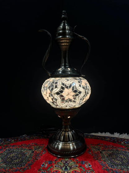 Mosaic Genie Lamp White Star Bright-Elevate your decor with the enchanting charm of our Turkish Mosaic Genie Lamp. Handcrafted by skilled artisans, this exquisite lamp captures the spirit of the mystical East. Its intricate mosaic glass design creates a m