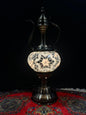 Mosaic Genie Lamp White Star Bright-Elevate your decor with the enchanting charm of our Turkish Mosaic Genie Lamp. Handcrafted by skilled artisans, this exquisite lamp captures the spirit of the mystical East. Its intricate mosaic glass design creates a m