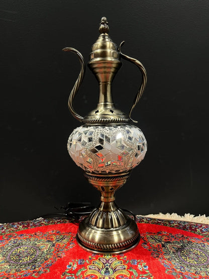Mosaic Genie Lamp White Star Bright-Elevate your decor with the enchanting charm of our Turkish Mosaic Genie Lamp. Handcrafted by skilled artisans, this exquisite lamp captures the spirit of the mystical East. Its intricate mosaic glass design creates a m