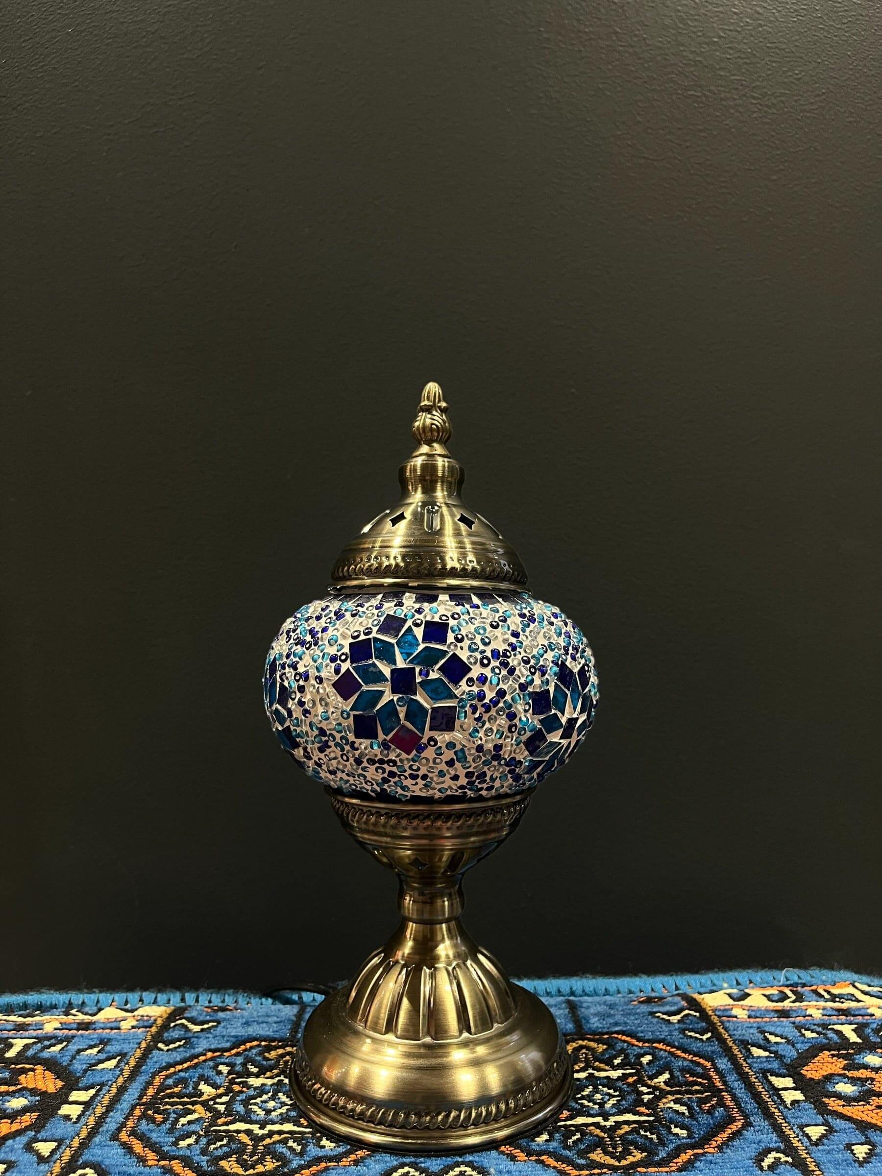 Mosaic Table Lamp with blue flower design, featuring vibrant glass mosaics and a decorative base.