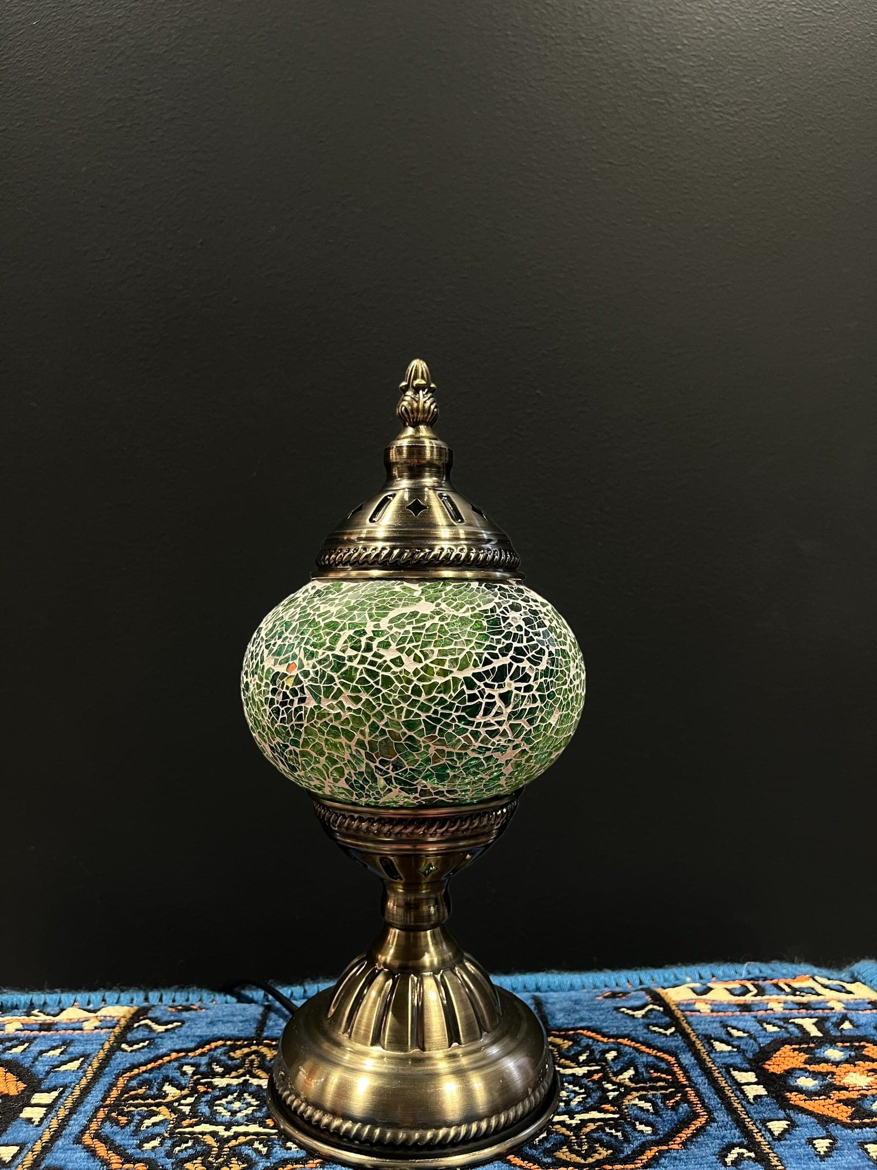 Mosaic Table Lamp with green crackle glass and brass base, perfect for decorative lighting and ambiance.