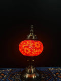 Mosaic Table Lamp with vibrant red glass design on a decorative table.