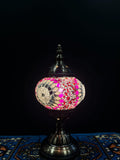 Mosaic Table Lamp illuminated with vibrant Turkish glass design, adding color and warmth to any space.