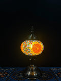 Mosaic Table Lamp with vibrant glass design featuring traditional Turkish patterns, illuminating warm colors.