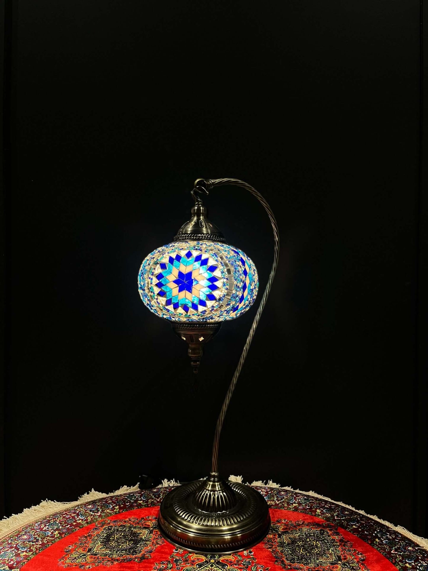 A mosaic lamp, also known as a Turkish lamps, is a decorative lighting fixture with intricate designs and colorful glass pieces.