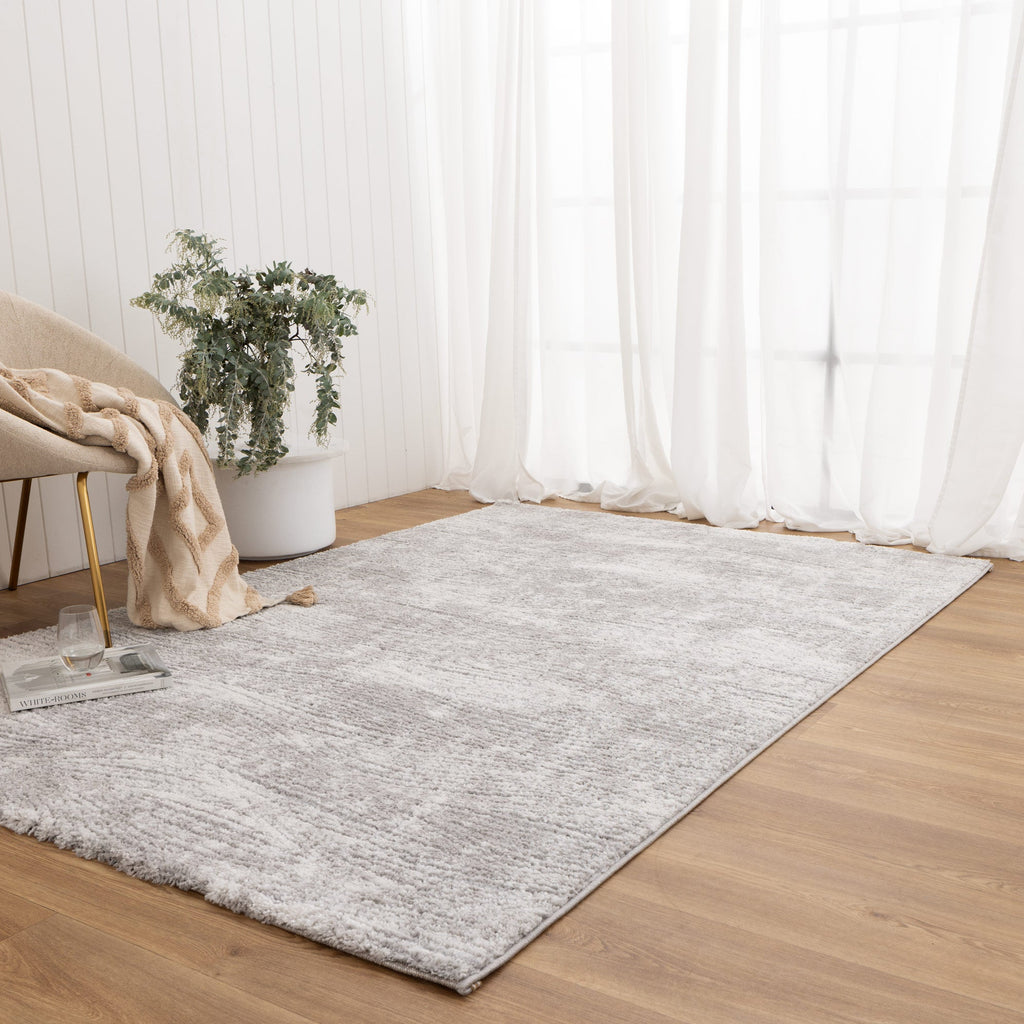 Nola N003 Grey Carved Rug styled with furniture