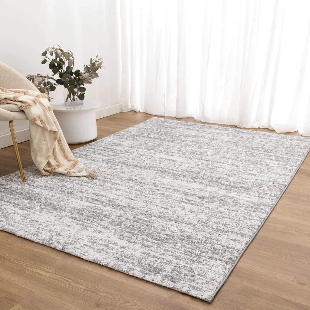 Nola N008 Grey Canvas Abstract Rug styled with furniture