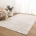 Nola N009 Beige Canvas Abstract Rug styled with furniture