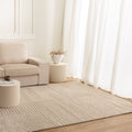 Nessa N100 Beige Arches Rug styled with furniture