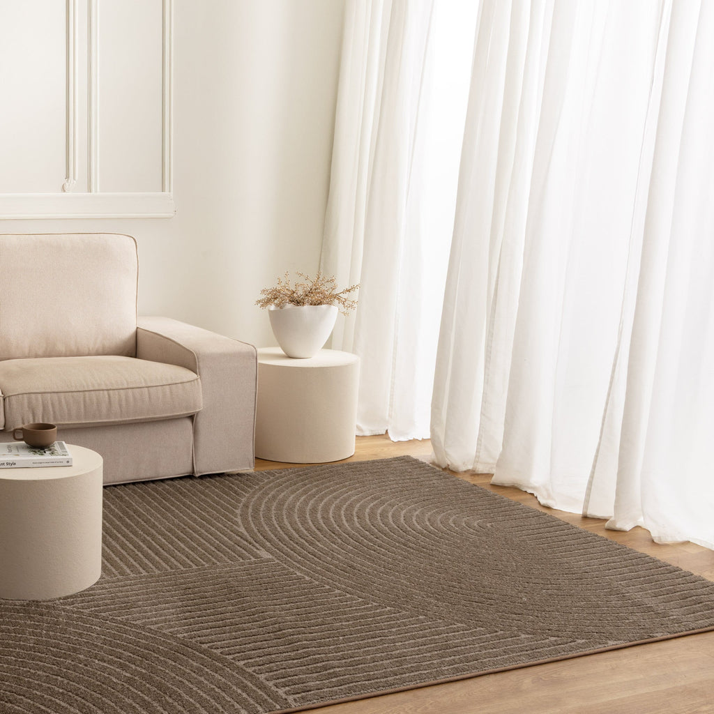 Nessa N200 Brown Arches Rug styled with furniture