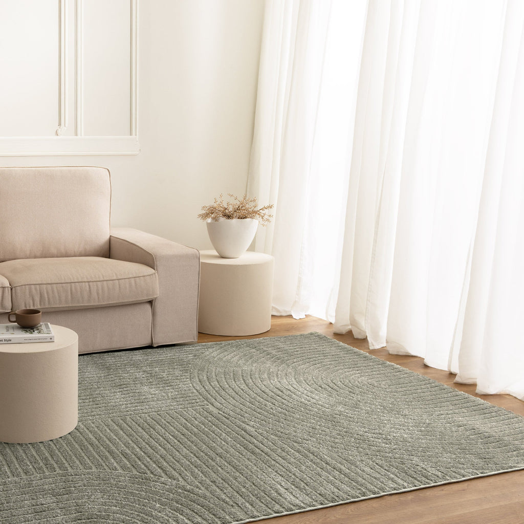 Nessa N300 Green Arches Rug styled with furniture