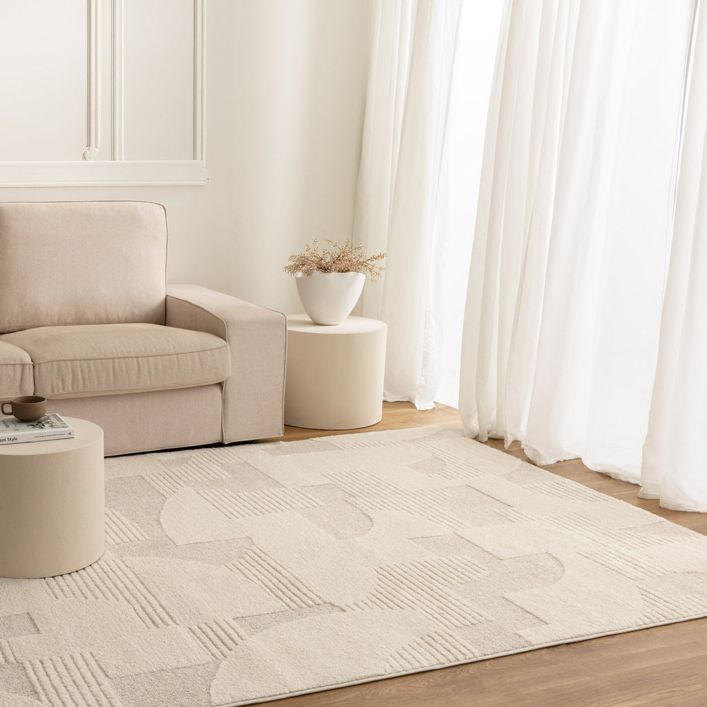 Nessa N500 Ivory Abstract Shapes Rug styled with furniture