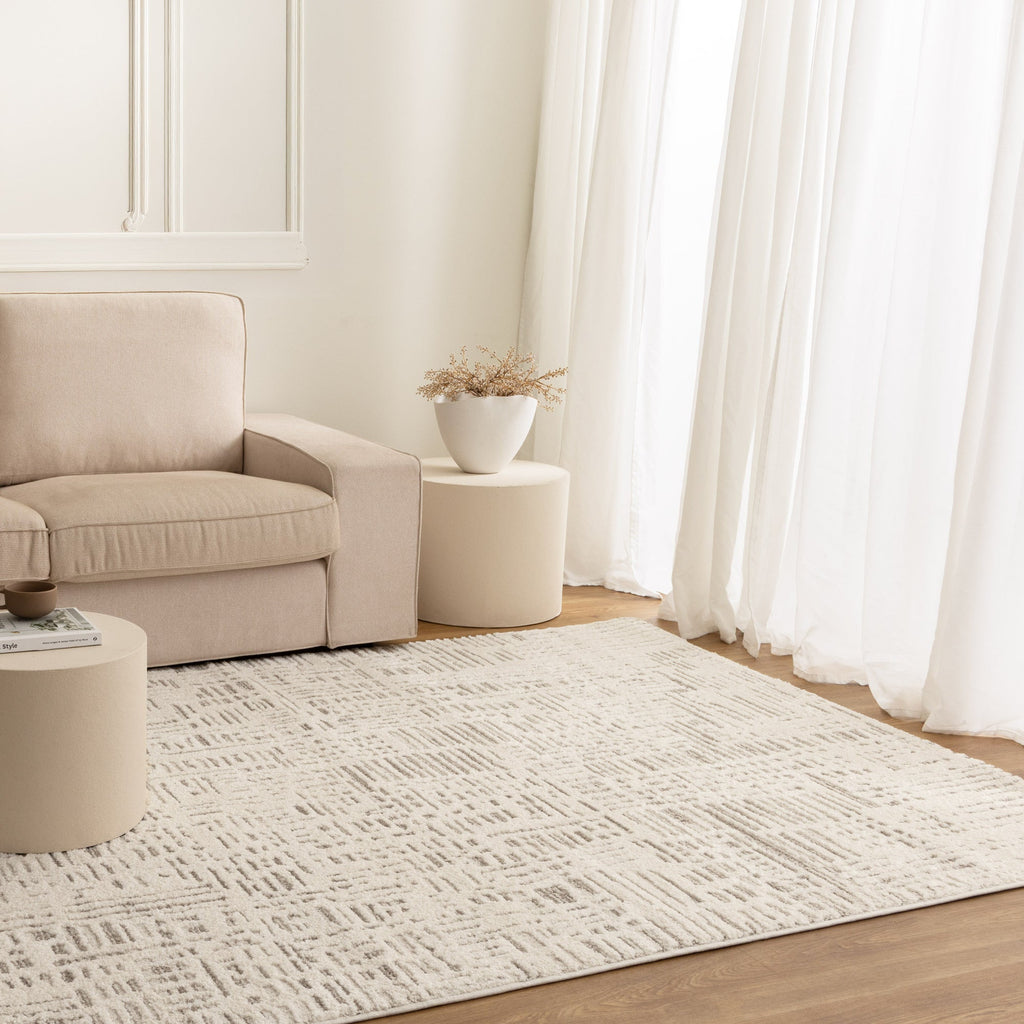 Nessa N600 Ivory Sculpted Geometric Rug styled with furniture