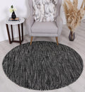 Nordic Black White Reversible Wool Round Rug styled with furniture